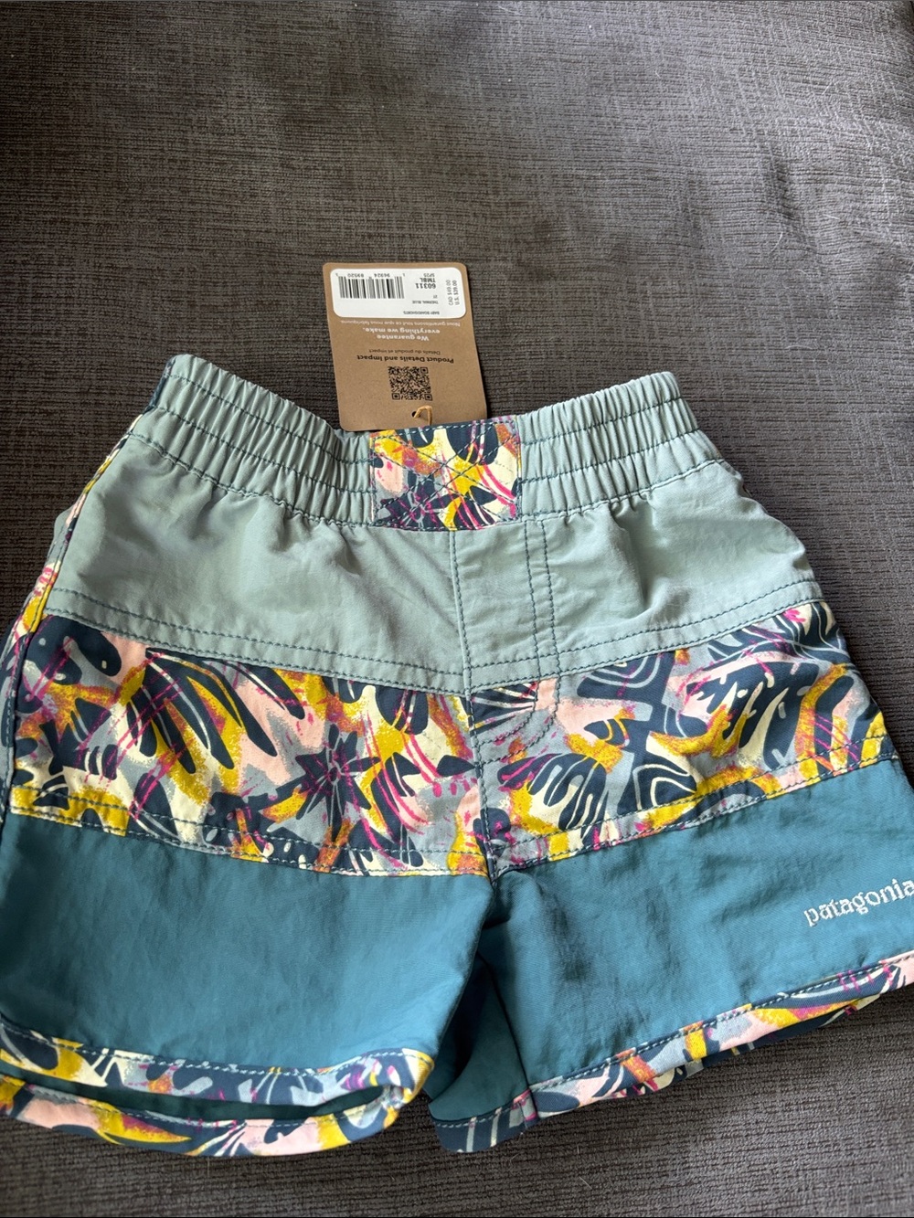 Patagonia Teal swim Shorts with Multicolor Floral Band